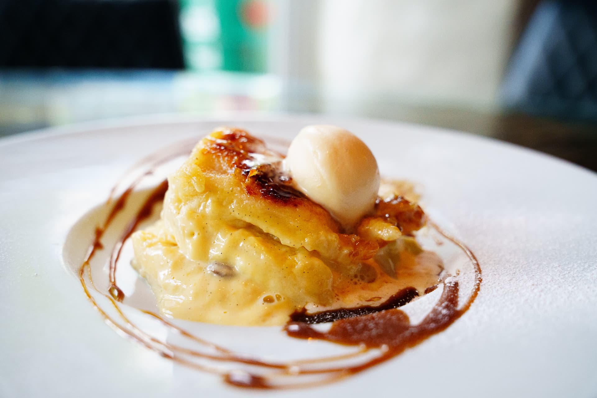 Bread and butter pudding with vanilla ice cream